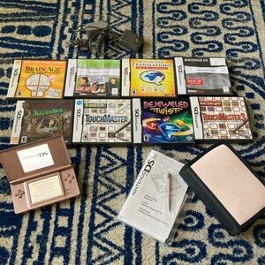 Nintendo DS Lite with games Rose Gold color